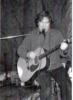 Doug playing acoustic guitar