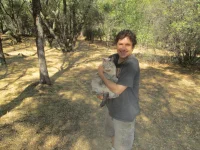 Mr. Bear came back as a cat! Doug with Muffin, summer 2014