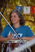 Giovanna on conga at the Cooked Rice concert 2014